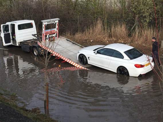 A car is recovered on Station Road, Bolton on Dearne. Picture: Andy Kershaw (@andyksheffield).