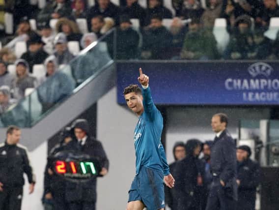 Real Madrid's Cristiano Ronaldo celebrates after scoring his side's second goal during the Champions League first leg quarter final soccer match between Juventus and Real Madrid, at Juventus Stadium in Turin, Italy