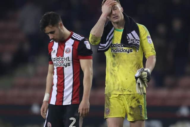 Despair for Simon Moore and George Baldock after Cardiff's equaliser