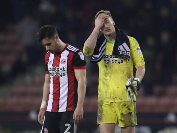 Despair for Simon Moore and George Baldock after Cardiff's equaliser