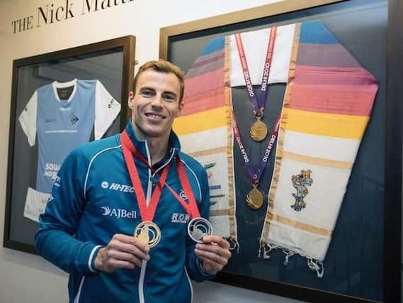 Nick Matthew with his Commonwealth games medals from four years ago