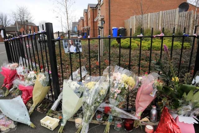 Flowers at the spot where Jarvin Blake was murdered in Burngreave