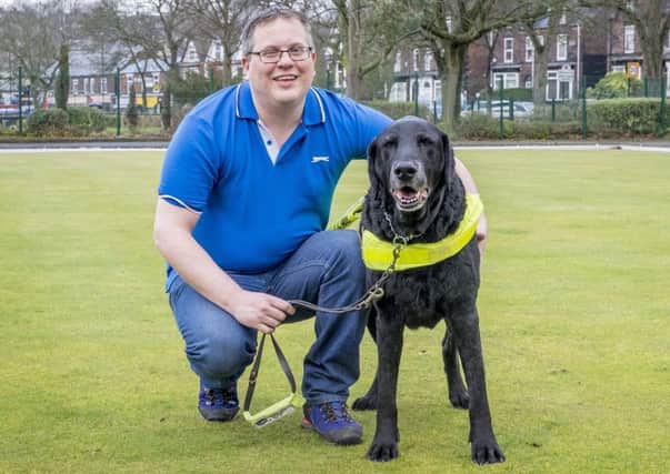 Kevin Seabrook and his retiring guide dog Jake