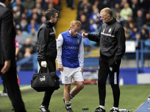 Bannan was forced off the field on the half-hour mark. Picture: Steve Ellis.