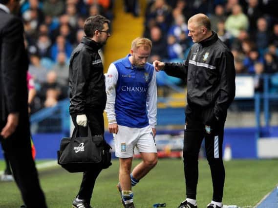 Barry Bannan comes off in the first half of Sheffield Wednesday's match against Fulham. Pic: Steve Ellis