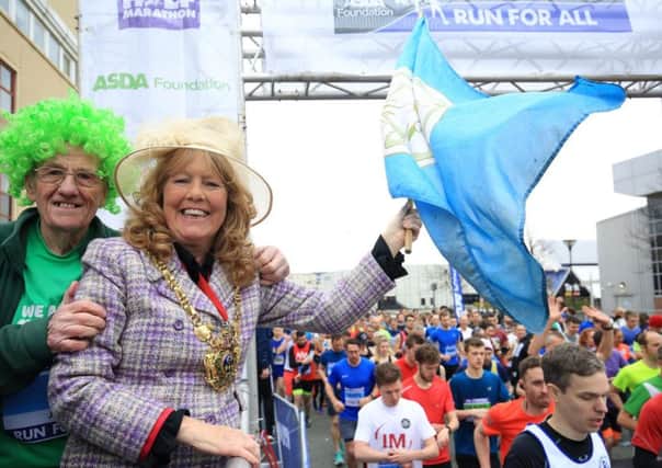 John Burkhill and Cllr Anne Murphy set the runners on their way. Picture: Chris Etchells.