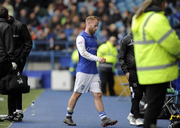 Another Owls injury set back Barry Bannan leaves the field in the first half.....Pic Steve Ellis