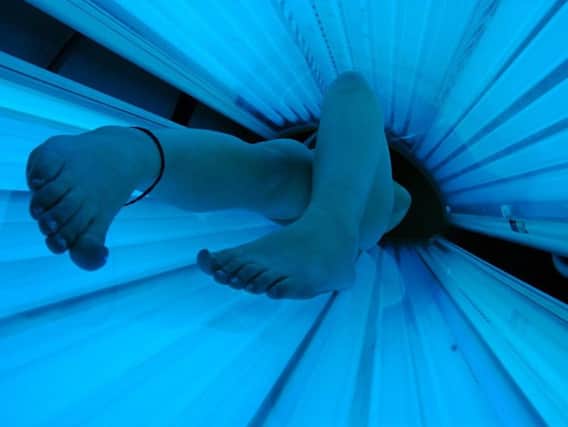 Are sunbeds safer than sunbathing outdoors?