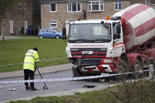 Police at the scene of the crash. Picture: Iain Ashmore.
