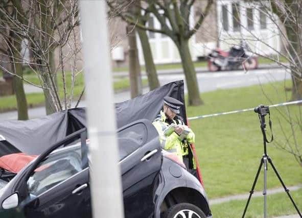 An accident investigator at the scene of a fatal collision in Barnsley yesterday (Pic: Iain Ashmore)