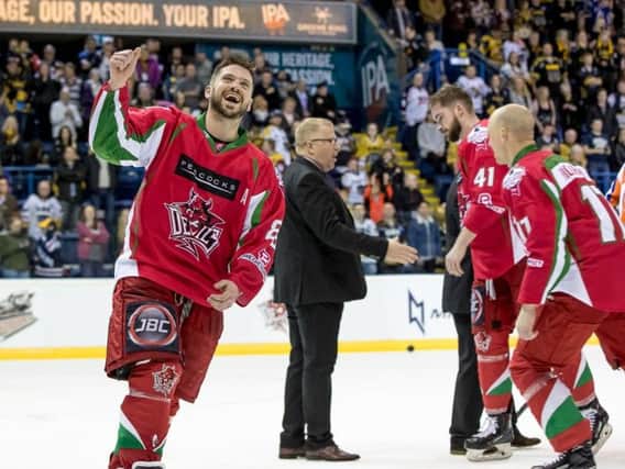 Steelers asst coach Jerry Andersson congratulates Devils on Sunday