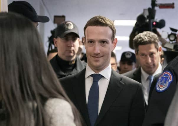 Facebook CEO Mark Zuckerberg arrives on Capitol Hill in Washington . (AP Photo/J. Scott Applewhite)