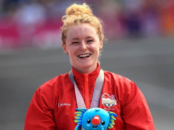 All smiles for Sheffield-based Annie Last as she receives her gold medal at the Commonwealth Games
