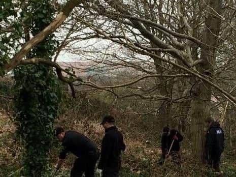 Officers searched open spaces during the operation