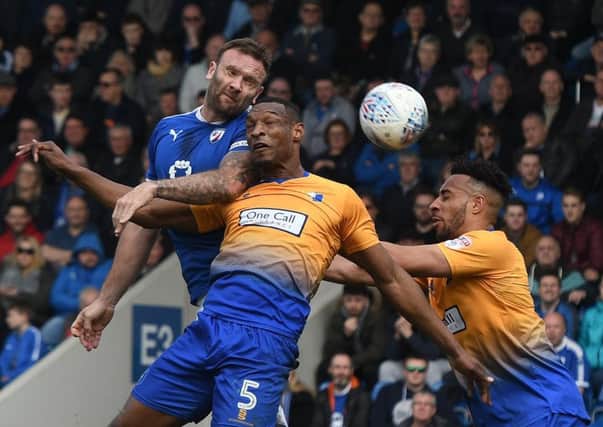 Picture Andrew Roe/AHPIX LTD, Football, EFL Sky Bet League Two, Chesterfield v Mansfield Town, Proact Stadium, 14/04/18, K.O 1pmChesterfield's Ian Evatt has a header on goalAndrew Roe>>>>>>>07826527594