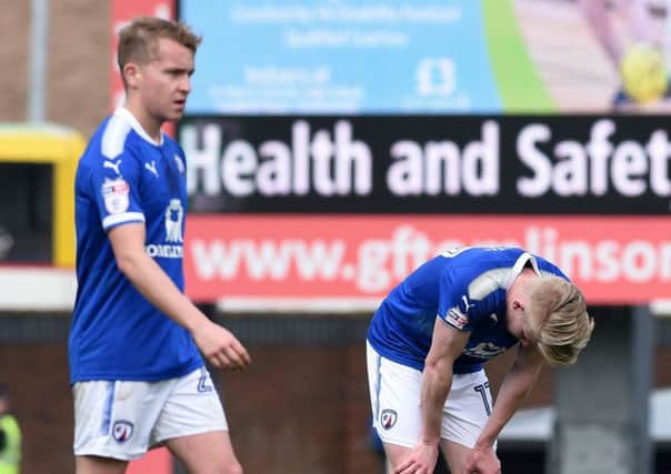 Picture Andrew Roe/AHPIX LTD, Football, EFL Sky Bet League Two, Chesterfield v Mansfield Town, Proact Stadium, 14/04/18, K.O 1pm

Chesterfield's George Smith and Louis Reed look dejected after their sides loss

Andrew Roe>>>>>>>07826527594