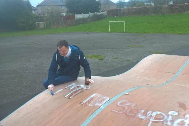 Terry Bawden clears graffiti at a skate park in Sheffield
