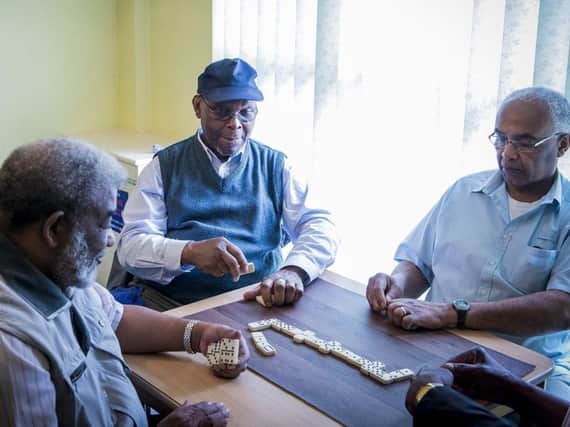 A game of dominoes at Sheffield and District African Caribbean Community Association (SADACCA)