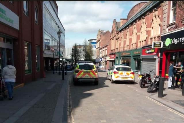 Police officers in Printing Office Street, Doncaster, after a stabbing