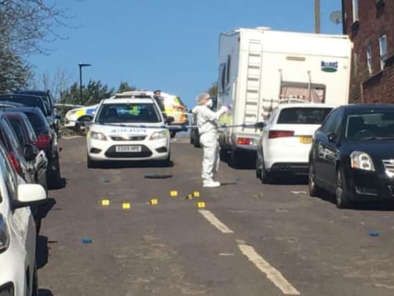 Forensic experts are working in Bransby Street, Upperthorpe, after a shooting