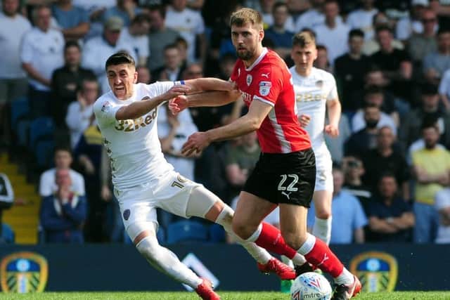 Leeds United v Barnsley..Pablo Hernandez is challenged by Gary Gardner..21st April 2018 ..Picture by Simon Hulme