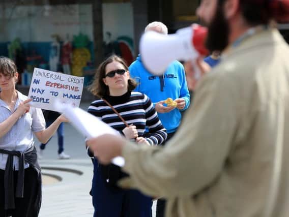 Disabled People Against Cuts protest outside Sheffield City Hall today.