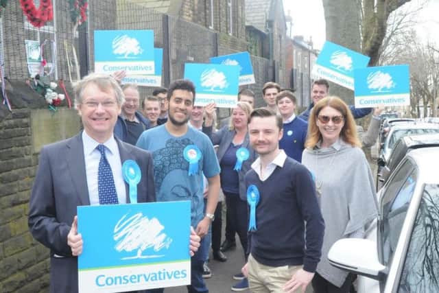 Ian Walker and fellow Conservative activists along Western Road in Crookes. Picture: George Torr