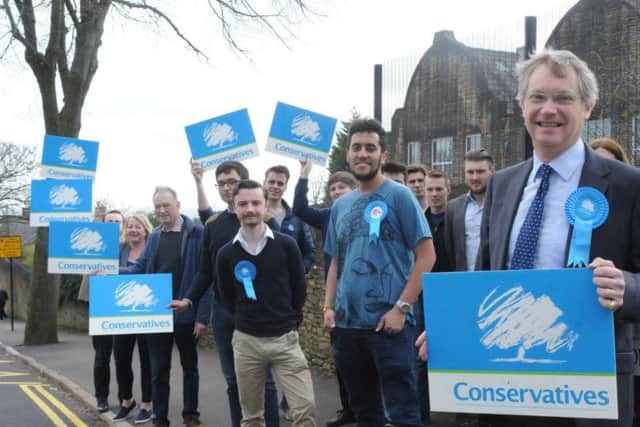 Ian Walker and fellow Conservative activists on the corner of Western Road and Mona Avenue in Crookes. Picture: George Torr