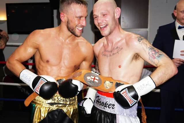 Sam and Kevin - sporting after the fight. Pic Andy Garner