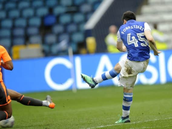 Fernando Forestieri lets fly to score Sheffield Wednesday's third goal against Reading