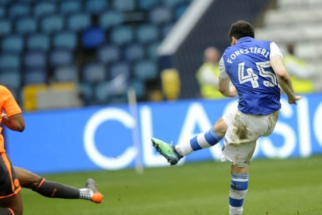 Fernando Forestieri lets fly to score Sheffield Wednesday's third goal against Reading