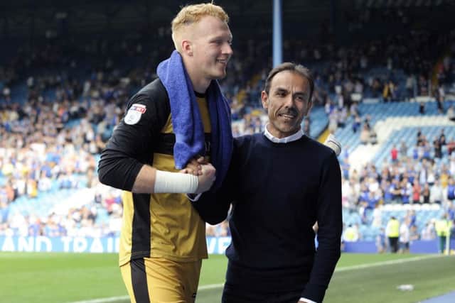 Owls boss Jos Luhukay with keeper Cameron Dawson