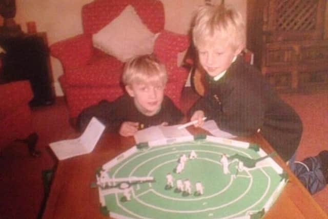 Then: Joe and Billy Root get an early taste of cricket