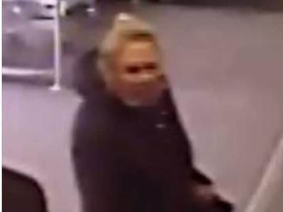 Police officers have released this CCTV image of a woman wanted over a purse theft in Doncaster