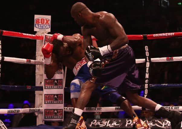 Audley Harrison (left) goes to the floor during his Heavyweight bout against Deontay Wilder in Sheffield