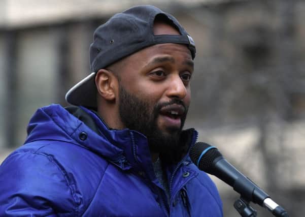 Coun Magid at a protest outside the Sheffield City Hall about racism.