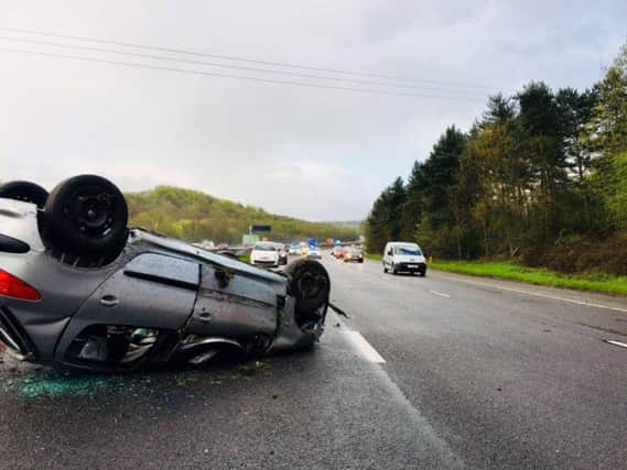 A car overturned on the M1 in South Yorkshire this morning