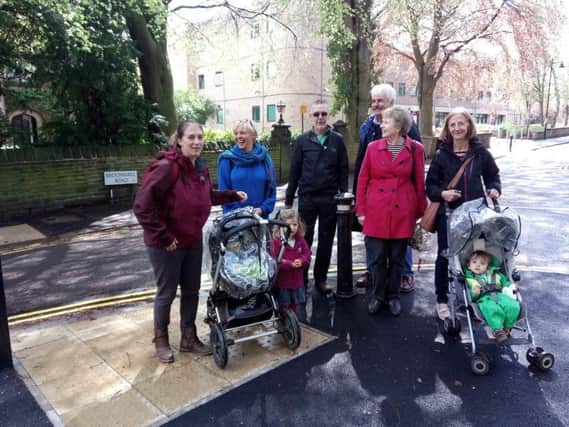 Pictured (from left) are Beth Cole with children Annabelle and Danielle, Sally Taylor, Peter Burridge, Mike Nichod, Linda Kirk, and Marie Lowe with Billy Lowe.
