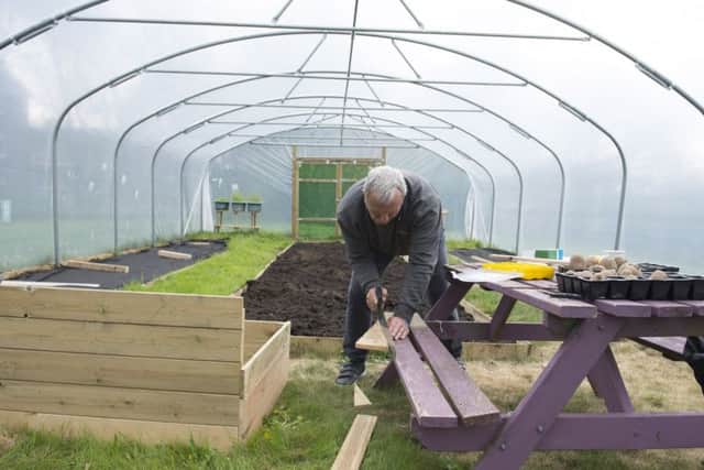 Herdings Community and Heritage Centre food growing
Tony Slack building cold frames