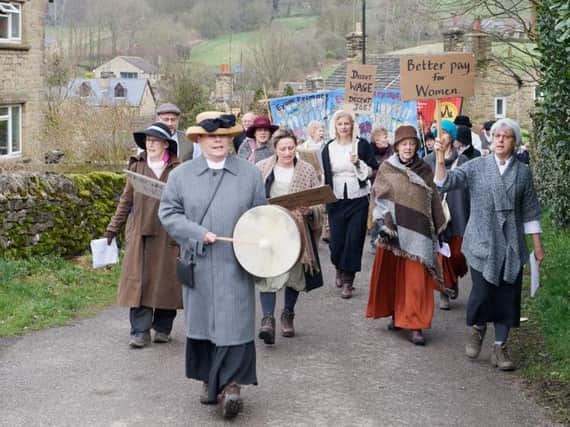 Women on the march to mark the centenary of the Eyam and Stoney Middleton boot and shoe-makers' strike