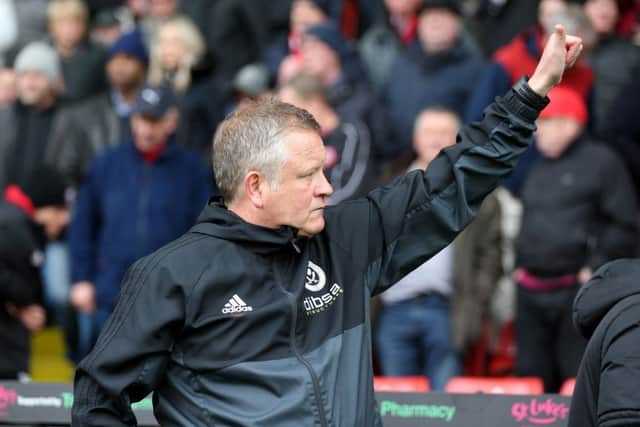 Chris Wilder waves from the touchline for Sheffield United's match against Preston on Saturday. Simon Bellis/Sport Image