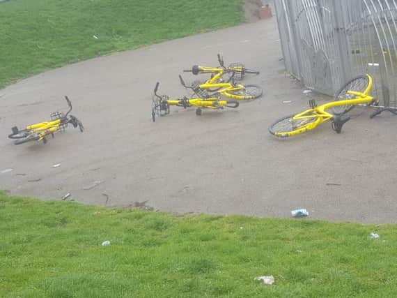 The five yellow bikes were found dumped and smashed up in Page Hall.