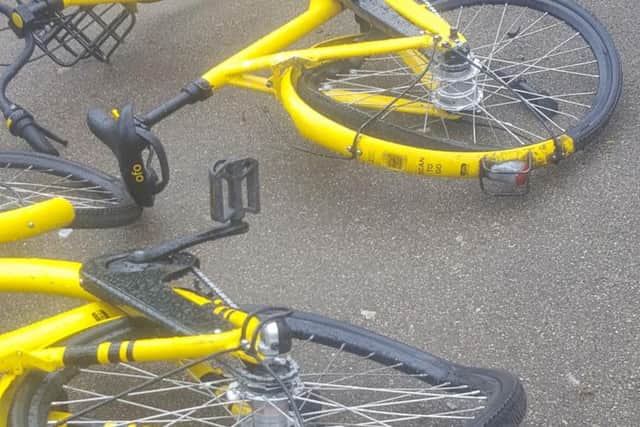The wheels of the bikes have been twisted by vandals.