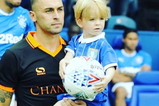 Jack Payne with Jack Hunt when he was mascot at the Sheffield Wednesday game against Rangers last July. Picture: Laura Webb.