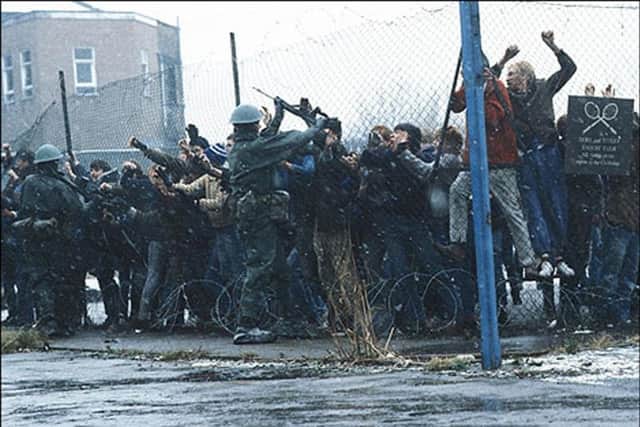 Looters are held back in a scene from Threads, the 1984 TV play