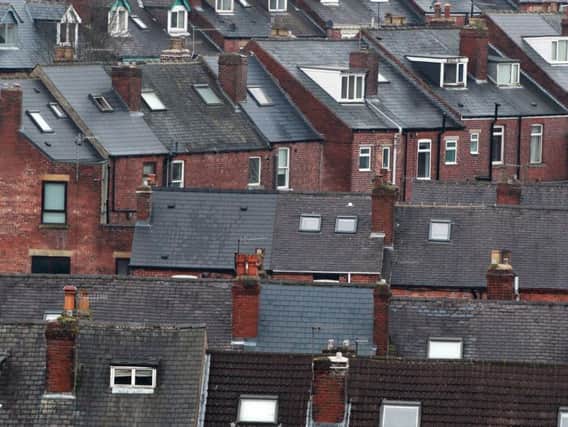 Stock photo: housing roof tops.