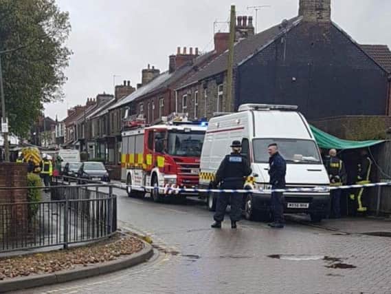 Police officers have sealed off a street in Doncaster today as part of a drug raid