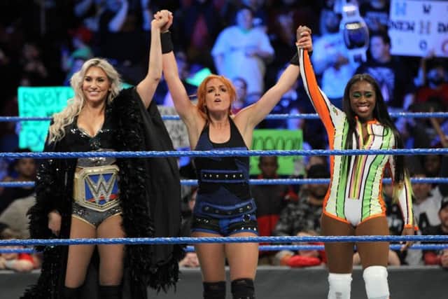The SmackDown Womens Championship Match will feature Charlotte Flair - daughter of two time Hall of Famer Ric Flair