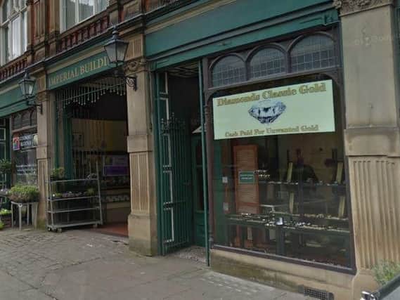 Two men have been charged over a robbery at a Rotherham jewellers