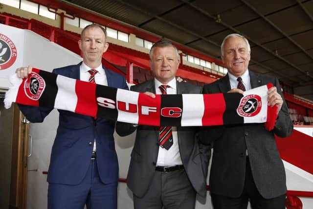 Chris Wilder with his assistant Alan Knill and co-owner Kevin McCabe 
Â©2016 Sport Image all rights reserved